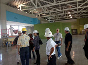 Carnival staff tours cruise terminal construction at Port Everglades.