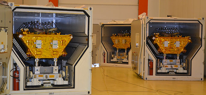 O3b's satellites waiting to be unloaded from shipping containers