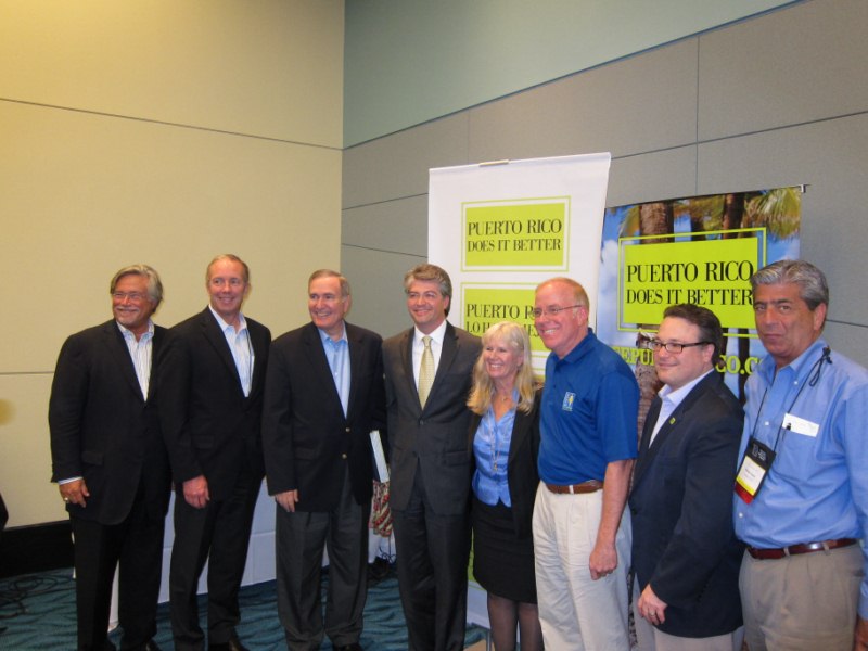 Industry leaders pose for a photo at the FCCA Conference
