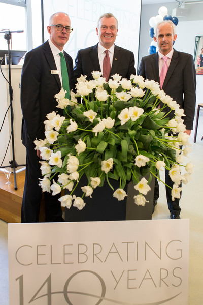 In celebration of its 140th anniversary, an official christening of the new Holland America Line “Signature” tulip took place in the Netherlands on Friday, April 19, at the world-famous Keukenhof Gardens. Here, company employees are left to right: Joe Slattery, vice president, international sales, marketing and planning; Stein Kruse, president and CEO; and Nico Bleichrodt, senior director, sales, Netherlands.
