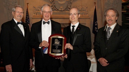 Cunard's Distinguished Service Award (L-R): Ronald L. Oswald, chairman, National Maritime Historical Society (NMHS); Richard du Moulin, overseer, NMHS; Stanley Birge, vice president, North America, Cunard Line; Richard Scarano, trustee, NMHS and owner, Scarano Boatbuilding