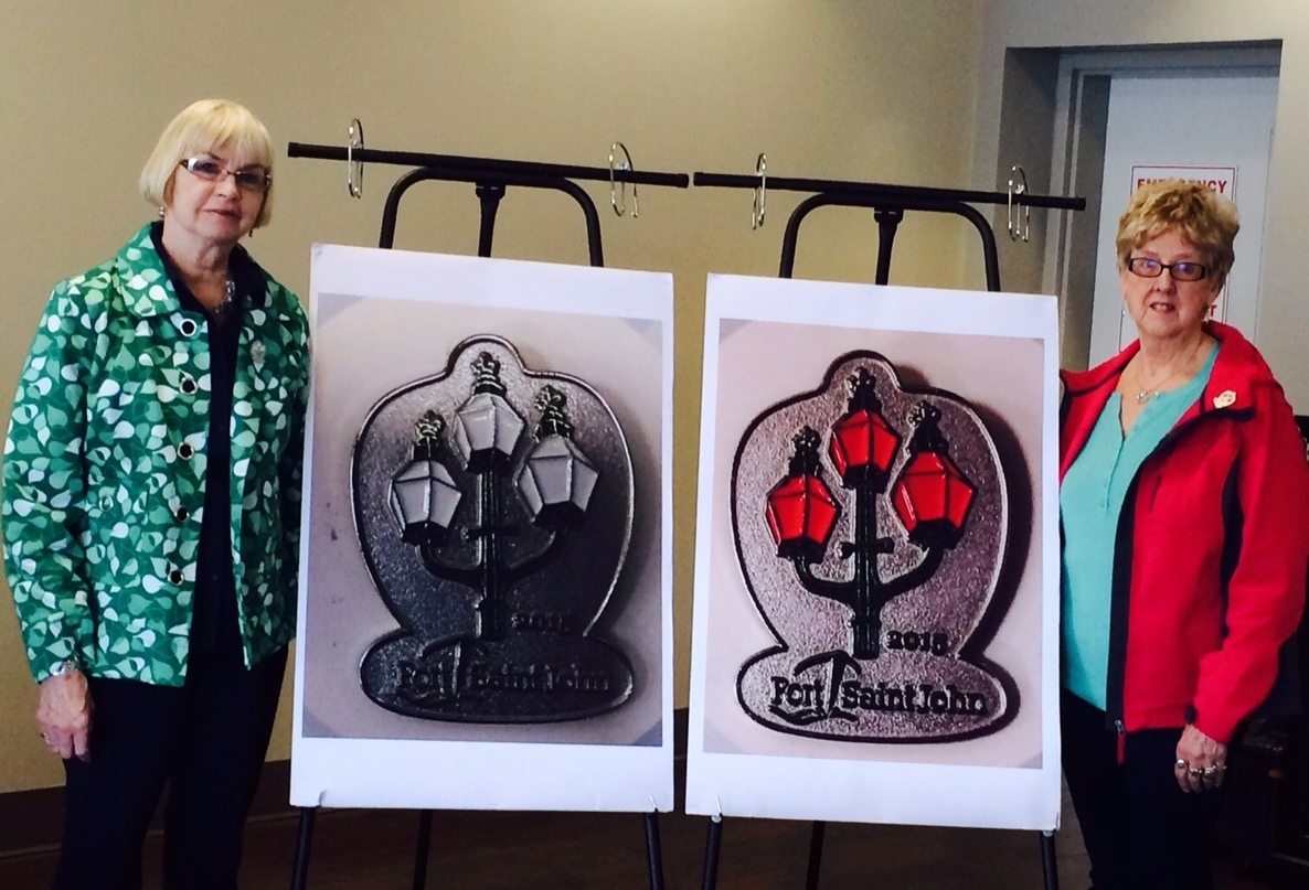 Cruise Meet and Greet team leaders, Margaret Mabey (left) and Joyce Robertson (right) with the new cruise lapel pin design for 2015.
