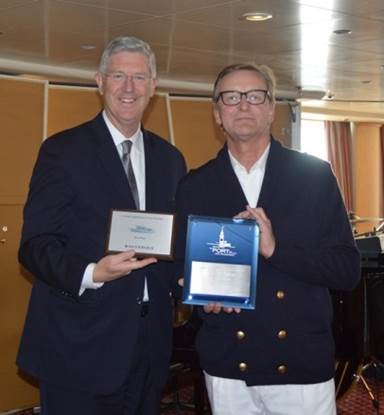 (L-R): Michael Nerney (Marketing Manager, Port of San Francisco) and Zbigniew Jaszewski (Staff Captain, Silver Whisper) exchange plaques.