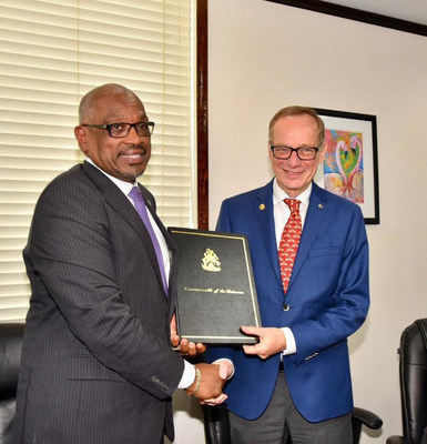 Dr. The Most Honorable Hubert A. Minnis, prime minister of The Commonwealth of The Bahamas, and Giora Israel, senior vice president of global port and destination development for Carnival Corporation, pictured at an official signing ceremony in Grand Bahama formalizing an agreement for Carnival Corporation to build two major port developments in The Bahamas.