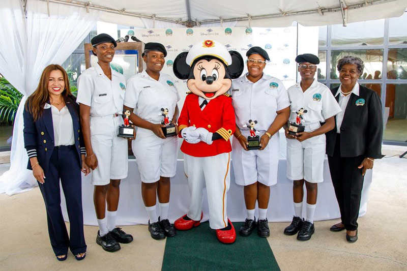 L-R: Yvonne Sweeney, VP Human Resources, Disney Cruise Line; Greene, Cadet Paula Greene; Cadet Christina Adderley; Captain Minnie Mouse; Cadet Antonique Lightbourn; Cadet Emily Bain and Dr. Brenda Cleare, LJM President during a special award ceremony held at the LJM Maritime Academy in Nassau Friday March 6, 2020. Disney Cruise Line awarded scholarships to four female cadets to attend the maritime academy. This scholarship program is part of a larger collection of initiatives Disney Cruise Line has implemented to inspire future maritime professionals and support communities across The Bahamas. (Photo by Tim Aylen)