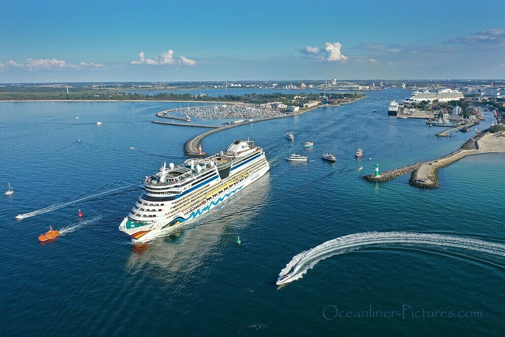 AIDAdiva leaves the port of Warnemuende